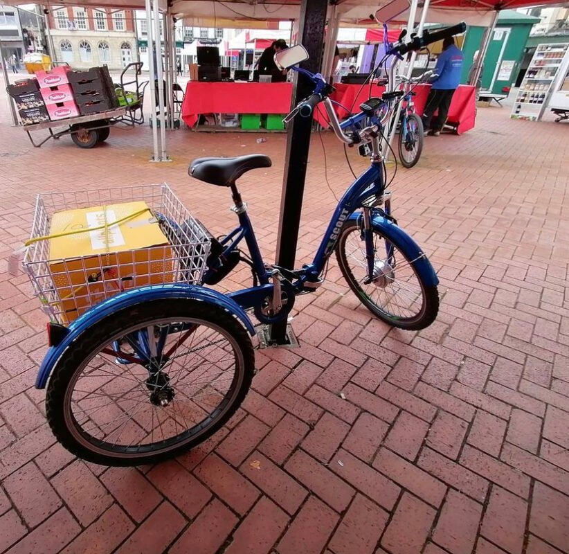 scout tricycle with box in basket
